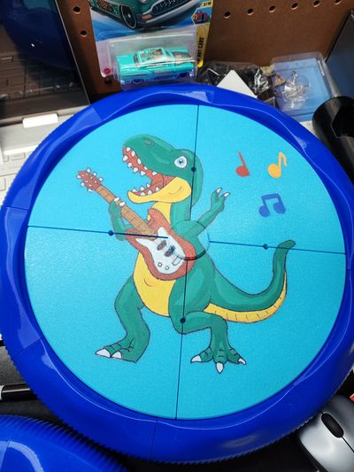 Close up of dinosaur inspired wheels for Toddler Mobility Trainer